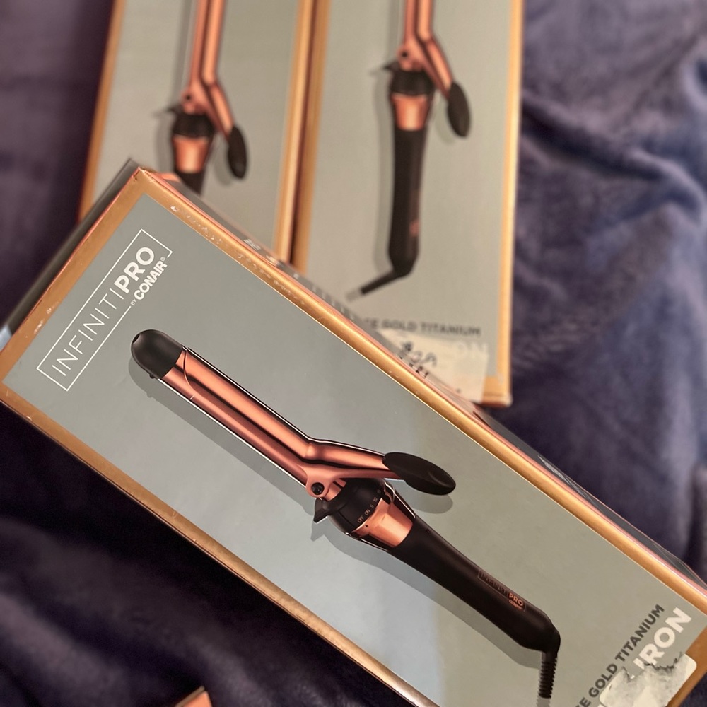 Brand New in box. I have 3.  1”Conair Titanum curling iron. $20 ea or 3/$50